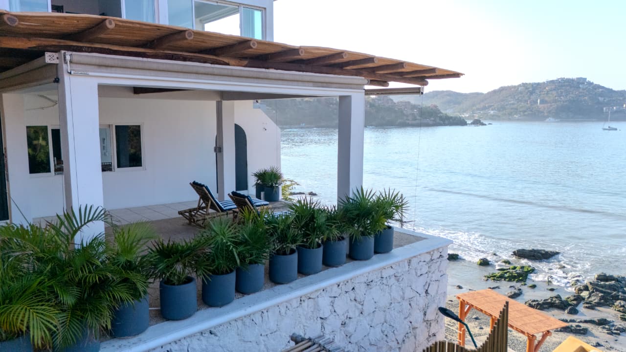 The terrace at Aqua, a few steps above the water